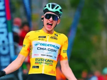 Paul Seixas grimacing in yellow jersey during a mountain stage at Tour de France 2026