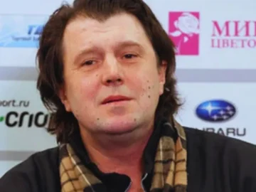 Portrait d’Artur Dmitriev, double champion olympique de patinage artistique.
