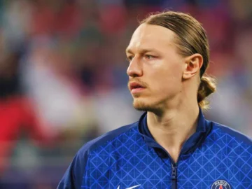 Matveï Safonov sous le maillot du PSG lors d'un match de Ligue des champions.